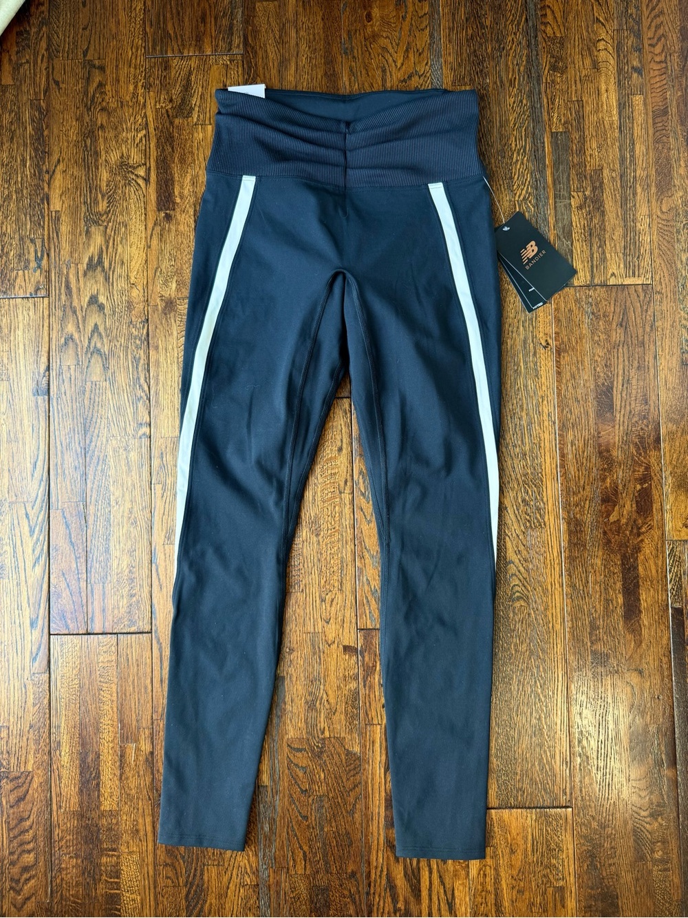 New Balance Bandier black leggings with white stripe detail